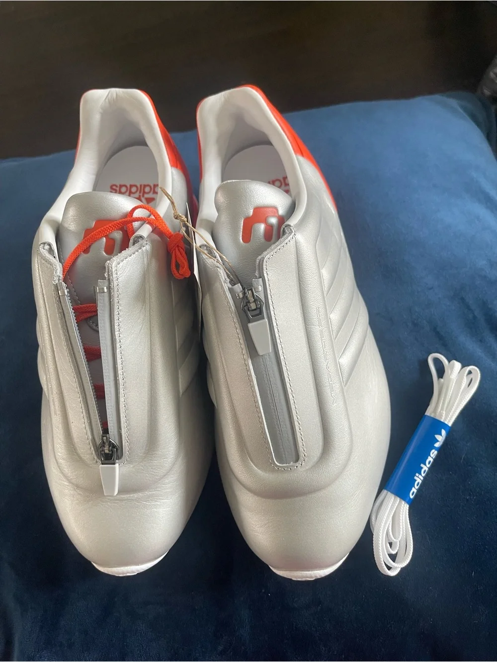 Men's Silver Athletic Sneakers with Orange Accent